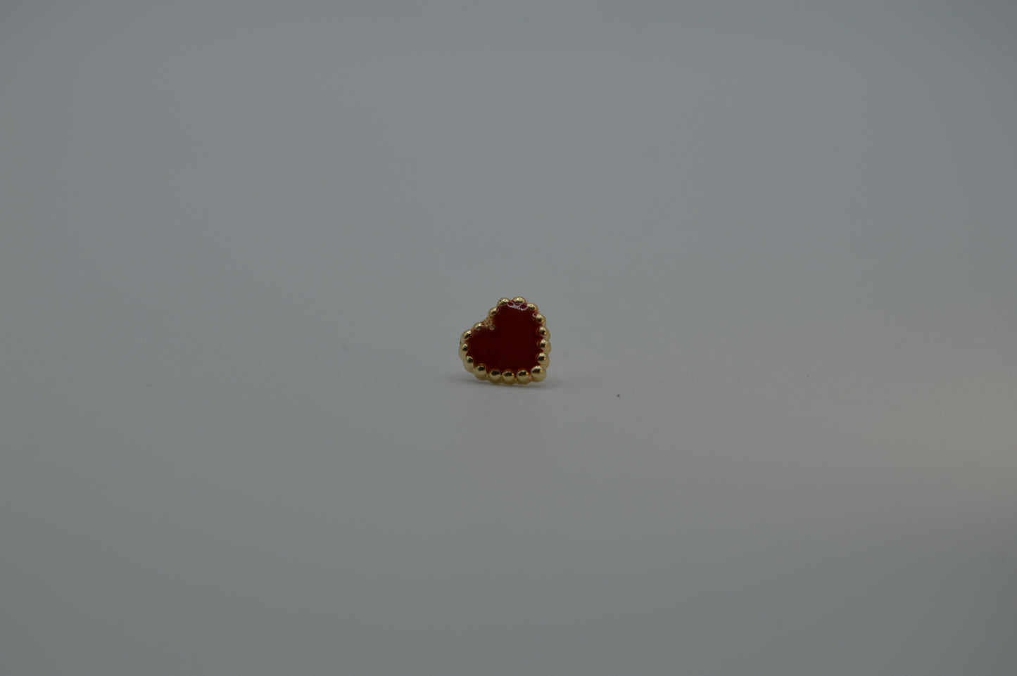 Corazón esmaltado rojo